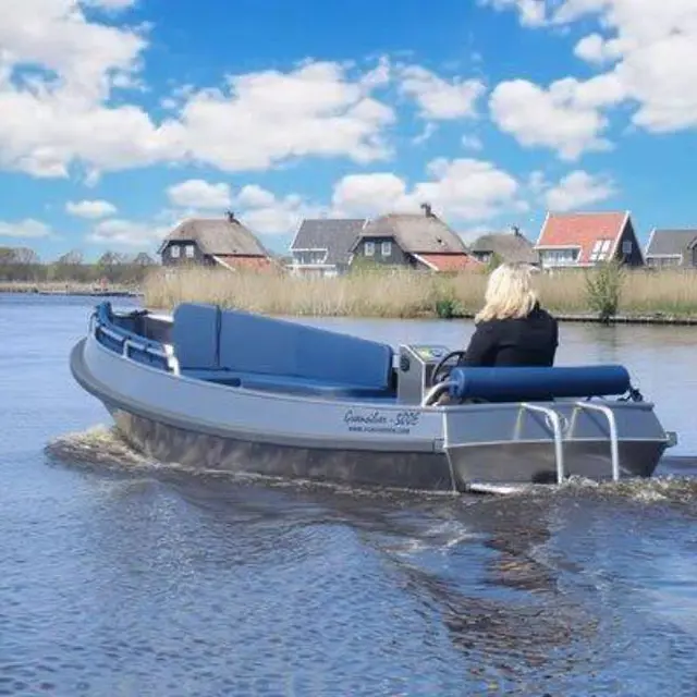 Sloep met schipper